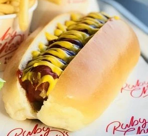 A Ruby Chews hot dog with ketchup and mustard